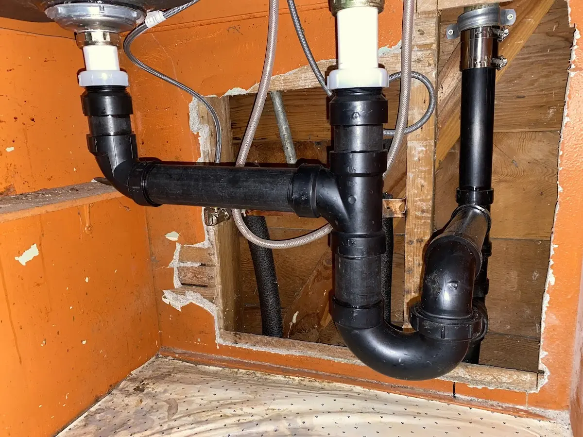 Professional Garbage Disposal Repair equipment and tools on the job in Winter Garden